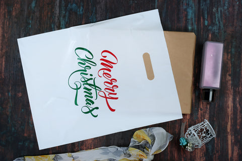 real life image of 12 x 15 white merry chrristmas printed bag 