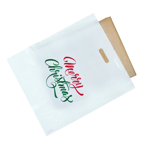 white merry christmas die cut bag with object inside 